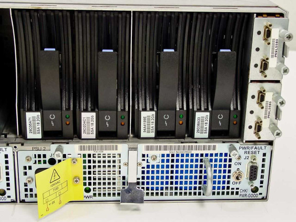 IBM 7133-D40 rear panel close-up showing SSA disk drive module labels, DB9 interface ports, power supply connectors, and PWR/FAULT RESET panel