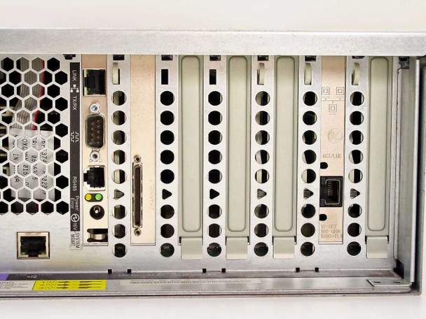 IBM xSeries 360 rear expansion area close-up showing PCI-X slots, serial port, parallel port, and additional I/O