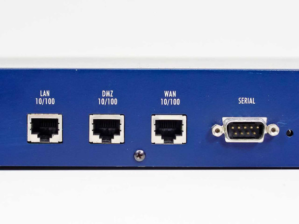 SonicWALL Pro rear port closeup – LAN 10/100, DMZ 10/100, WAN 10/100 RJ-45 jacks and Serial DB9 connector labeled