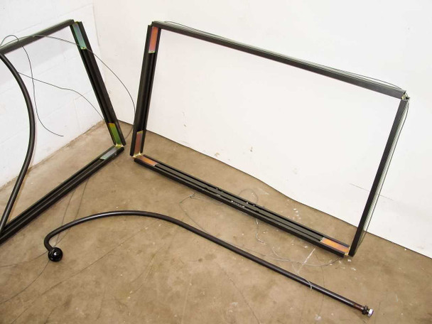 OmniMount ARC-FPD lot of 2 — both frames and detached mounting arms viewed from above