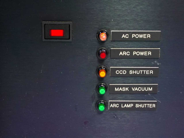 Close-up of front panel indicator labels: AC Power, ARC Power, CCD Shutter, Mask Vacuum, ARC Lamp Shutter with corresponding colored LEDs and power rocker switch