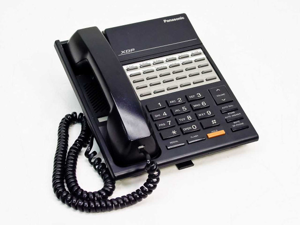 Panasonic KX-T7220 XDP digital office phone front view showing handset, keypad, and DSS buttons in black