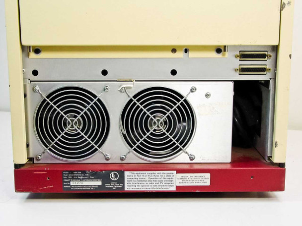 Opcom D.I.A.L. PBX rear panel close-up – dual large cooling fans, parallel port connector visible upper right, and rating/compliance label at base