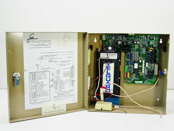 Telular-Adcor T111JM Cellular Transmitter – enclosure open showing internal PCB, Telguard module, and wiring diagram