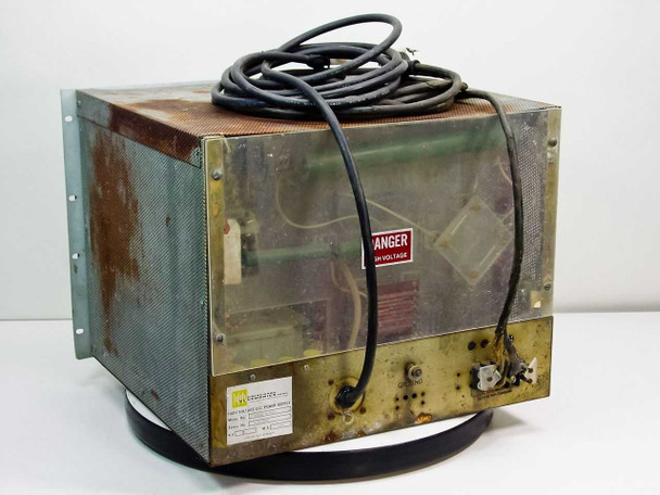 Universal Voltronics BAM-2-400 High Voltage Power Supply — rear/side view showing mesh ventilation panel, Danger High Voltage label, internal components visible through clear cover, and rating plate
