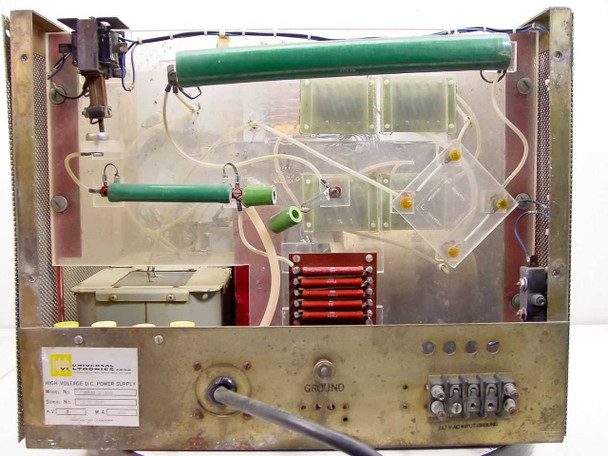 Universal Voltronics BAM-2-400 internal rear view — green high-voltage resistor stack, HV multiplier/rectifier assembly, small mains transformer, stacked ceramic capacitors, and rear Ground binding post terminal block visible