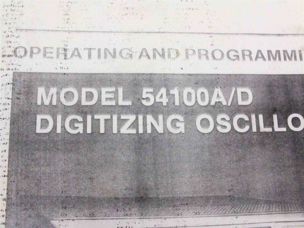 HP 54100A/D manual cover close-up showing title 'Operating and Programming Manual, Model 54100A/D Digitizing Oscilloscope'