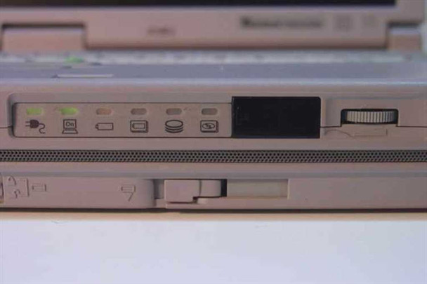 Toshiba Tecra 750CDM front edge close-up showing status indicator LEDs and PCMCIA slot cover