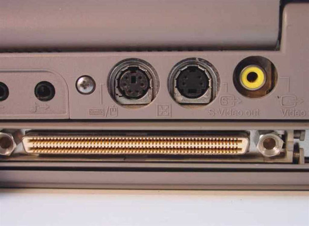 Toshiba Tecra 750CDM rear close-up showing S-Video output, second S-Video port, composite video out, and docking connector