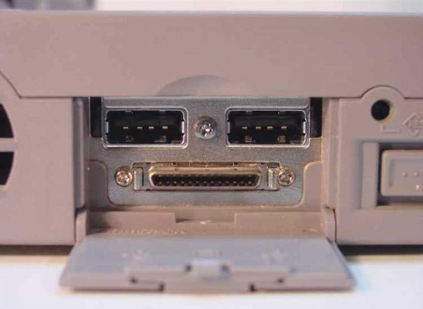 Toshiba Tecra 750CDM rear showing two USB-style or proprietary ports above a SCSI/dock connector