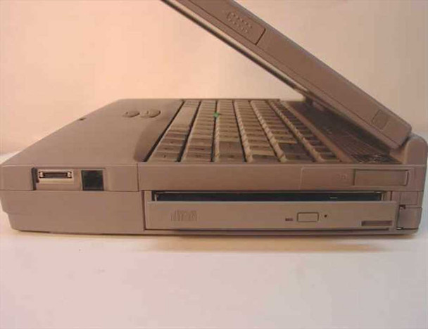 Toshiba Tecra 750CDT left side view showing CD-ROM drive bay and left-side expansion port connector