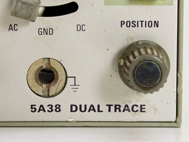 Tektronix 5A38 Dual Trace label detail – close-up of lower front panel showing BNC input, AC/GND/DC coupling switch, and POSITION knob