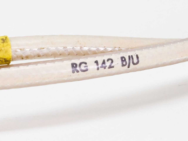 Close-up of RG-142 B/U marking printed on white braided PTFE cable jacket