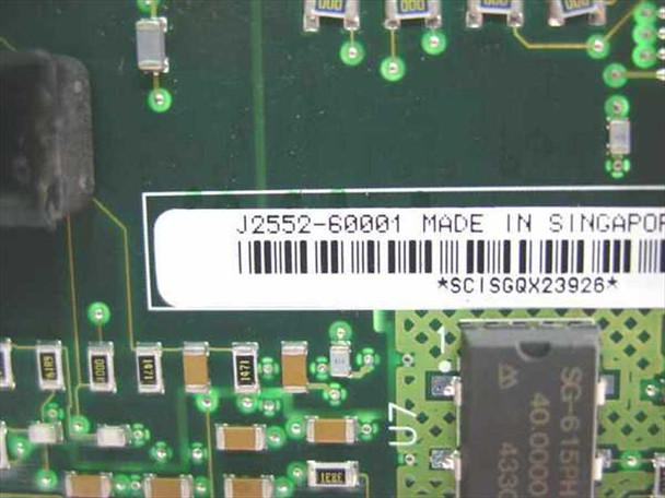 HP J2552-60001 JetDirect card – PCB underside label showing part number J2552-60001 and Made in Singapore marking