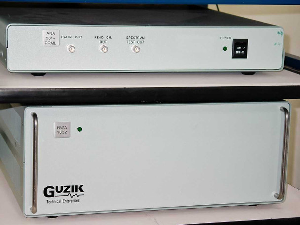 Guzik ANA-961+ PRML Analog Channel unit (top) and RWA-1632 PRML Read Write Channel Analyzer (bottom) — front panel view showing BNC outputs and power switch