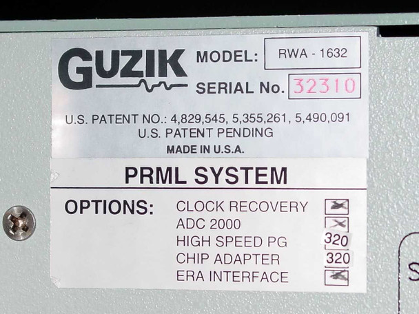 Guzik RWA-1632 PRML System identification label showing Model RWA-1632, Serial No. 32310, patent numbers, and active options: High Speed PG 320, Chip Adapter 320