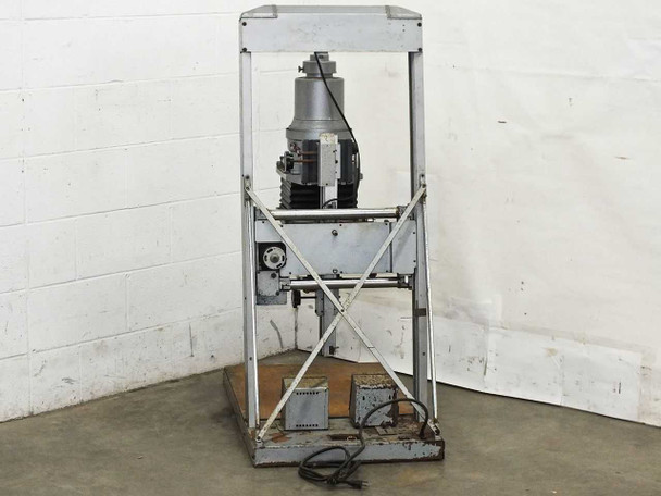 Beseler CB7 Enlarger rear view showing scissor-lift carriage mechanism, column, power cord, and control box on base