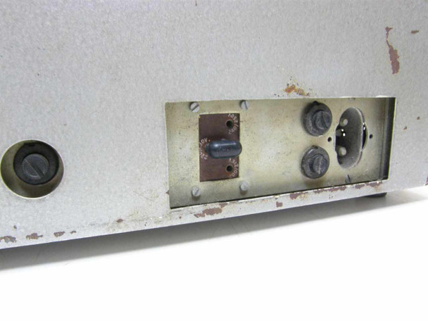 Ericsson Thermistor Bridge Type 4 – rear connector recess close-up showing 3-pin round power inlet, slide switch, and fuse holder with paint wear and surface rust