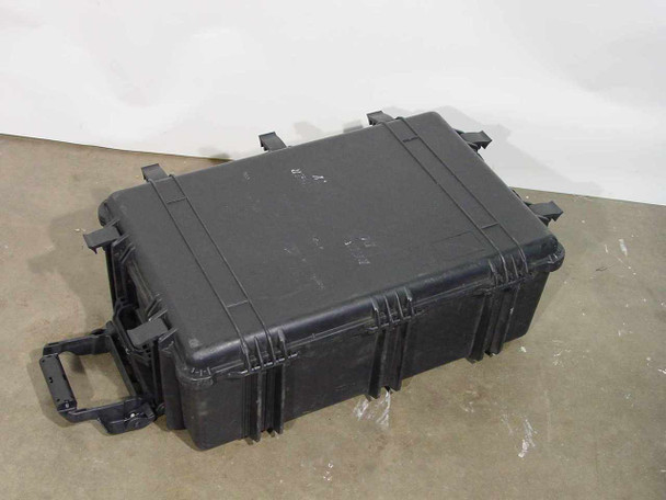 Waterproof rolling hard case closed, top view showing latches and retractable pull handle