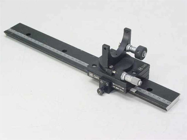 Oriel optical alignment rail full assembly – front view showing 16-inch rail with stage, mirror mount, and micrometer mounted