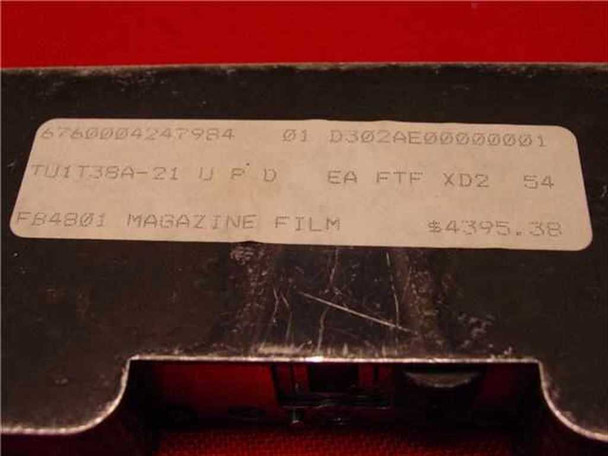 Close-up of Photo-Sonics LB-40A label: P/N TU1T38A-21, F84801 Magazine Film, government cost $4,395.38