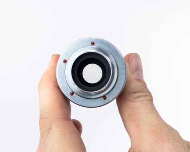 Photo-Sonics KB-19A lens – rear mount view showing chrome bayonet or c-mount style lens flange with red locking screws