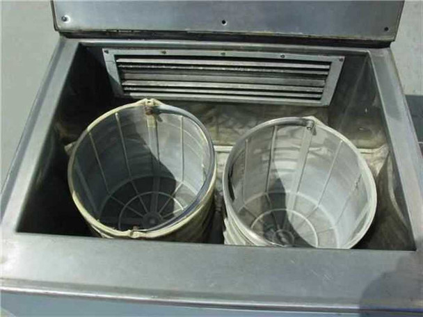 Bendix Sonic Energy 272-157 dryer – interior chamber with two removable cylindrical mesh baskets installed