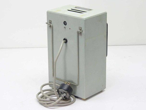 Radiometer Copenhagen CDM 2e conductivity meter — right-side and rear view showing gray metal enclosure, ventilation slot on top, and attached power cord with round plug