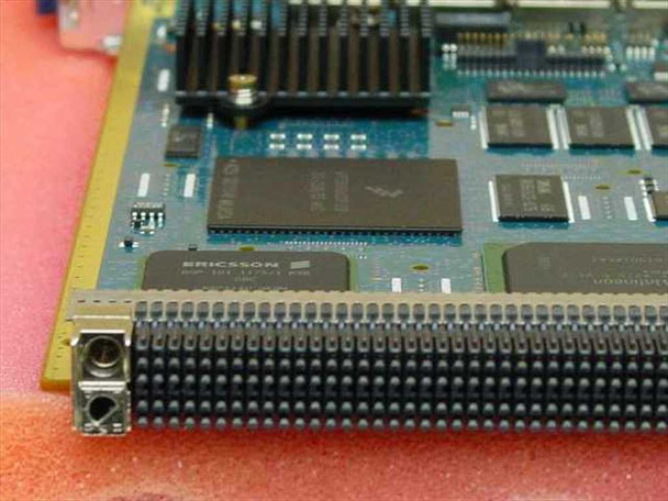 Ericsson CBU1 PCB close-up showing Ericsson-branded IC and large backplane edge connector fingers