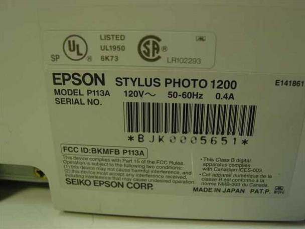 Epson Stylus Photo 1200 P113A rating plate label showing model, 120V 50-60Hz 0.4A, serial number, UL and CSA certifications, Made in Japan