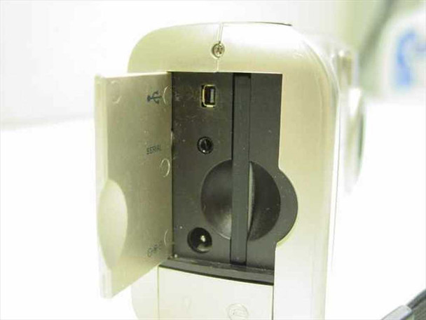 Polaroid PDC-1300 — side port door open showing USB and serial connectors