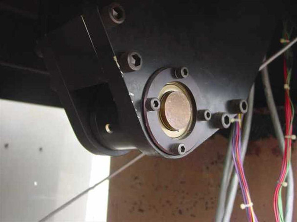 Underside view of Oxberry 1500 camera column mount showing circular brass bearing race and bolt pattern
