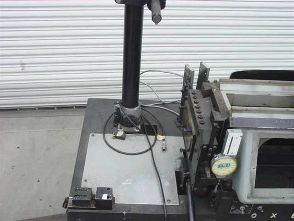 Oxberry 1500 top platform view showing vertical camera column, dial indicator, and partial front panel with Oxberry lettering