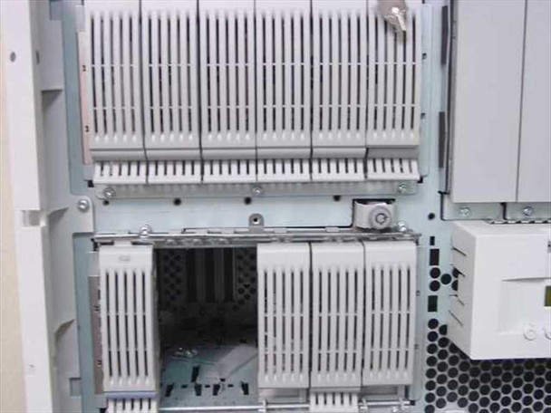 HP NetServer LH3r internal hot-swap drive bay assemblies showing upper and lower bay carriers