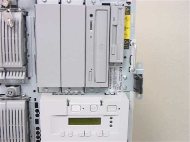 HP NetServer LH3r right side internal view showing CD-ROM drive, floppy bay, and LCD operator panel