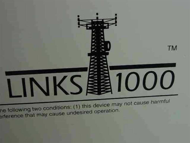 DSC Links 1000 logo closeup on enclosure panel with FCC compliance text