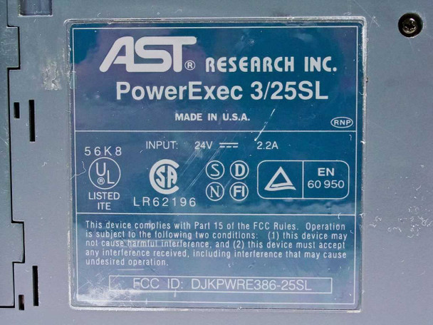 AST Research Inc. PowerExec 3/25SL rating plate — 24V 2.2A input, Made in USA, FCC ID DJKPWRE386-25SL, UL and CSA certifications