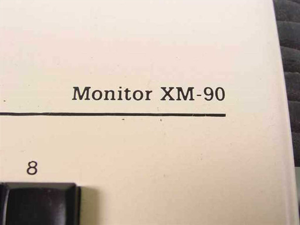 Close-up of Oxford Monitor XM-90 model designation printed on the right side of the front panel