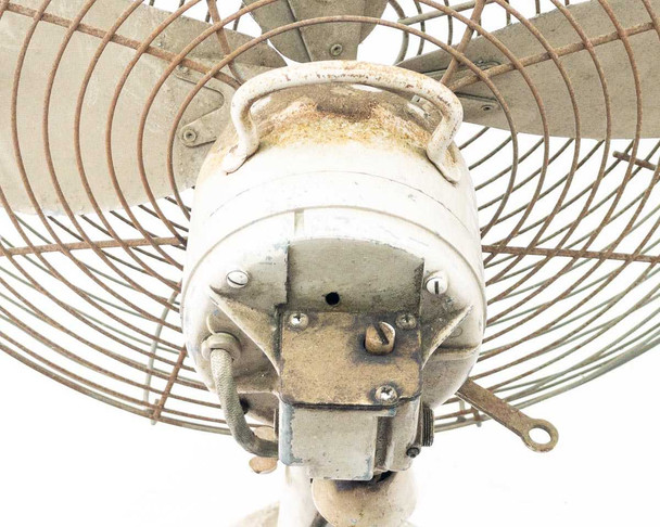 Robbins and Myers CG16 fan — rear view of motor housing and oscillation yoke assembly showing mounting hardware and surface rust