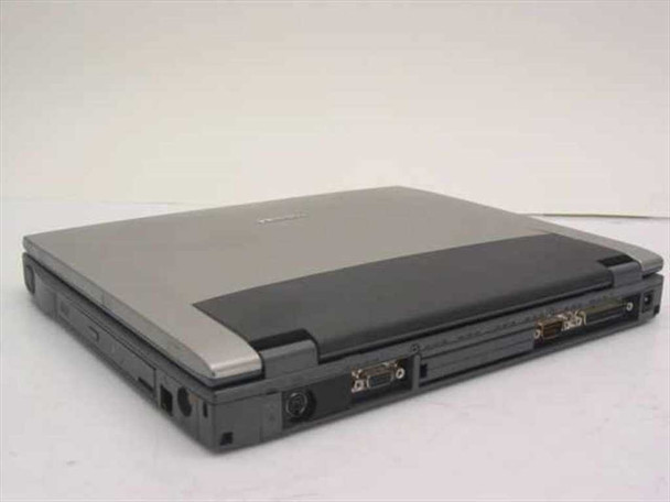 Toshiba Tecra 8100 PT810U laptop – rear closed view showing VGA port, parallel port, PS/2 connector, and other I/O ports