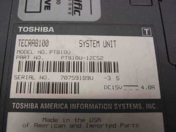 Toshiba Tecra 8100 PT810U-12C52 bottom label showing model number, part number, serial number, and DC 15V 4.0A power rating