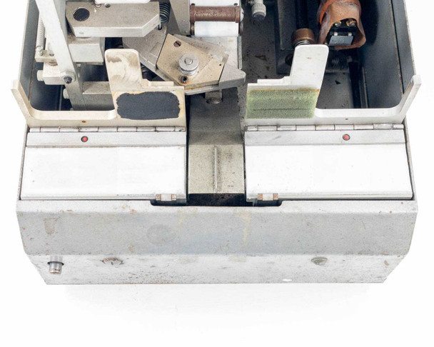 Hollywood Chicago 2816 splicer – top-down view of splicing mechanism showing cutting blade assembly, green scrub pad, and film guide rails