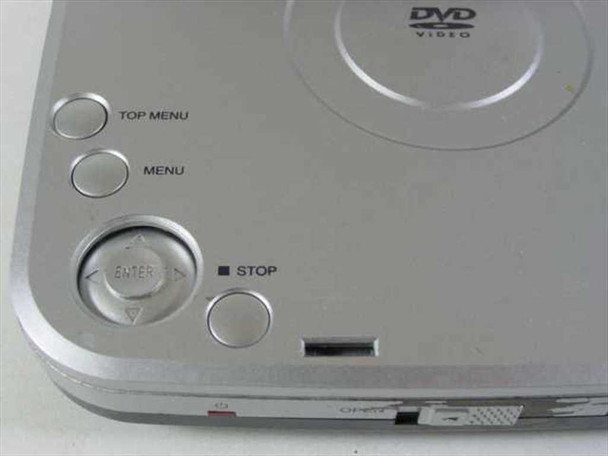Initial IDM-9530 portable DVD player top panel showing Top Menu, Menu, Enter navigation pad, and Stop button controls