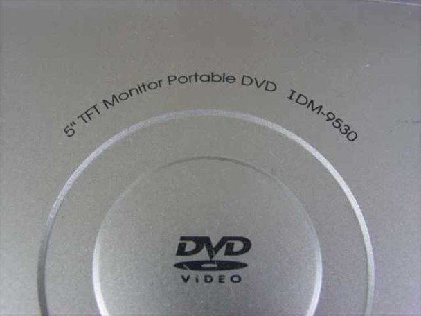 Initial IDM-9530 label on lid reading '5 inch TFT Monitor Portable DVD IDM-9530' with DVD Video logo