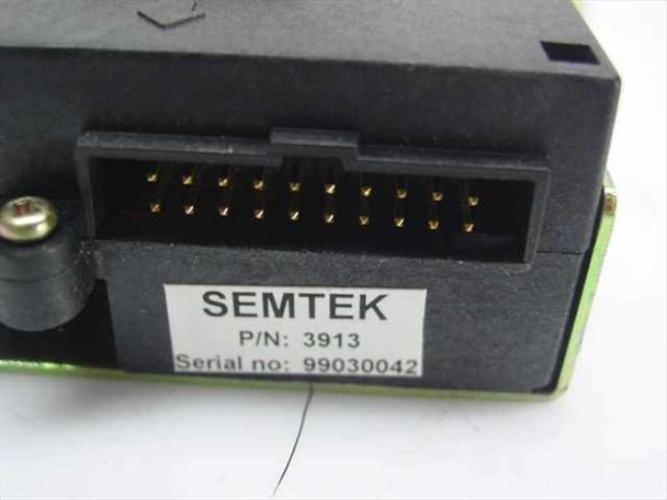 Semtek 3913 close-up of 20-pin RS-232 connector and product label showing P/N 3913 and serial number
