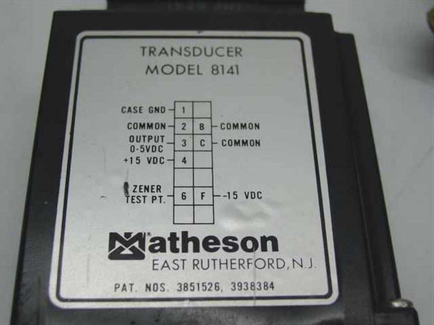 Matheson Model 8141 Transducer label close-up showing pin wiring diagram, 0-5VDC output, +15VDC supply, patent numbers, East Rutherford NJ