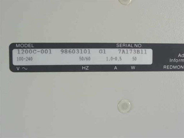 ADIC DAT Autochanger 1200C-001 — close-up of bottom rating label showing Model 1200C-001, part number 98603101, revision G1, serial number 7A173B11, and power specs 100–240V 50/60Hz 1.0–0.5A 50W