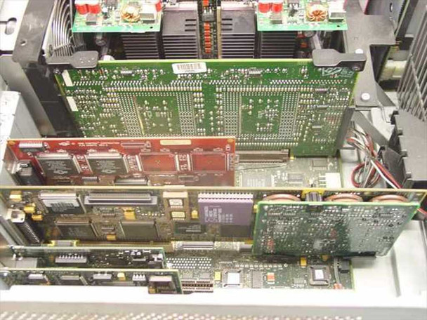 Compaq ProLiant Series 3135 server – internal view showing multiple populated expansion boards including a red board and yellow/green boards in card cage
