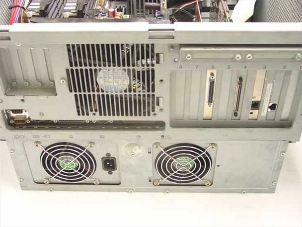 Compaq ProLiant Series 3135 server – rear panel and lower chassis view showing dual fans, expansion slot brackets, and partially populated I/O slots