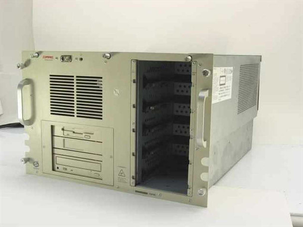 Compaq ProLiant Series 3135 rackmount server – angled front-left view showing front panel, drive bays, floppy drive, CD-ROM, and empty hot-swap bay area